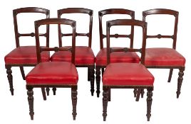 A set of six Victorian mahogany and red leather upholstered dining or side chairs,
