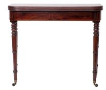 A Regency mahogany and line inlaid tea table,