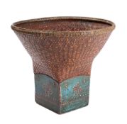 A Balinese rattan rice basket and a decorated and lacquered barrel-shaped food container and cover,