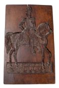 A northern European carved walnut rectangular gingerbread mould depicting King Friedrich Wilhelm IV