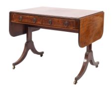 An early 19th Century mahogany and inlaid sofa table, bordered with boxwood and ebony lines,