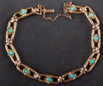 A fancy-link, cabochon-cut turquoise bracelet, stamped '15', total length ca. 19cm, total weight ca.