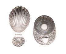 A Jockey Cap pattern caddy spoon, maker Francis Howard, Sheffield 1975,
