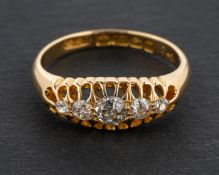An Edwardian, 18ct gold, old-cut diamond and CZ five-stone ring, total estimated diamond weight ca.