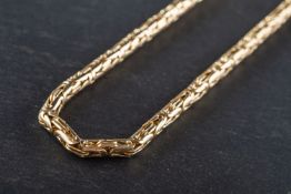 A Byzantine-link chain, stamped '14K', total length ca. 64cm, total weight ca. 42gms.