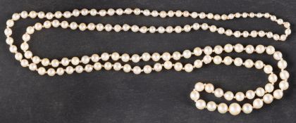 A graduated, single-strand, cultured pearl necklace, the cultured pearls of light yellow hue,