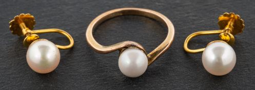 A cultured pearl ring and pair of earrings, estimated diameter of cultured pearl to ring ca. 6.