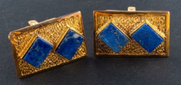 A pair of rectangular, lapis lazuli cufflinks, stamped '585', length of cufflink head ca. 2.