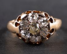 An old-cut diamond cluster ring, total estimated diamond weight ca. 0.