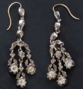 A pair of white paste chandelier earrings, the earrings with hook fittings, length of earrings ca.