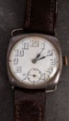 An early 20th century silver Rolex wristwatch the round dial with Arabic numerals,