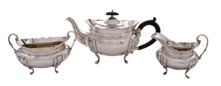 A George V silver three piece silver teaset, maker Hawksworth, Eyre and Co Ltd, Birmingham 1934,
