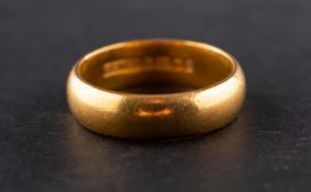 A 22ct. gold band ring, ring size J, total weight ca. 5.3gms.