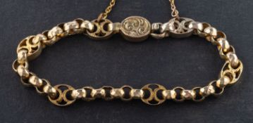 A 19th century, belcher-link bracelet with engraved, quadrapartite spacers, total length 17.
