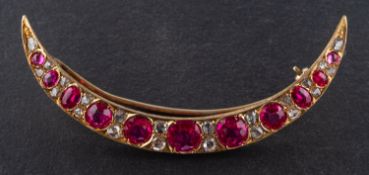 A synthetic ruby and rose-cut diamond crescent brooch, total estimated diamond weight ca. 0.