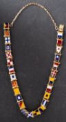 A vari-coloured enamel flag bracelet, depicting nautical signal flags, stamped '18CT',