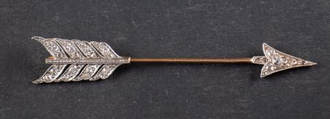 A rose and single-cut diamond tiepin, designed as an arrow, total estimated diamond weight ca. 0.