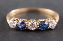 A round, mixed-cut sapphire and old-cut diamond five-stone ring, total estimated diamond weight ca.