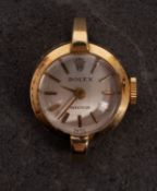 Rolex, an 18ct gold lady's wristwatch the dial with baton numerals and hands and signed Rolex,