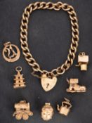 A 9ct gold curb-link bracelet with heart-shaped clasp,
