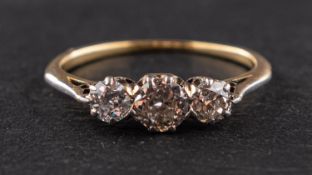 An old-cut diamond three-stone ring, total estimated diamond weight ca. 0.