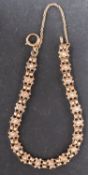 A fancy-link seed pearl bracelet, total length ca. 19cm, total weight ca. 11.4gms.