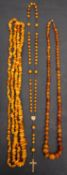 Three amber bead necklaces, including a necklace with 'butterscotch' amber beads, diameter ca. 4.