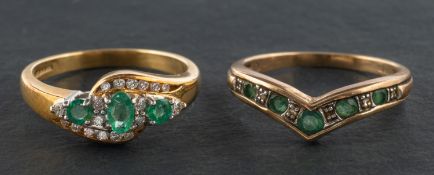 Two emerald and diamond rings, including an 18ct gold, round and oval,