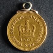 An 1806 Georgian Third Guinea (mounted).