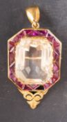 An octagonal, step-cut citrine and calibre-cut probably amethyst brooch/ pendant,