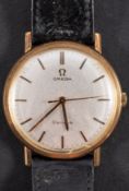 Omega, a gentleman's gold wristwatch, the dial with black and gold baton numerals and hands,