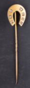 A rose-cut diamond tie-pin of horseshoe design, total estimated diamond weight ca. 0.08ct.