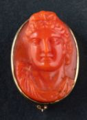 A coral cameo brooch, depicting the bust of a lady, total length ca. 3.1cm, total weight ca. 9.2gms.