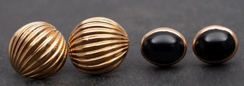 Two pairs of 9ct gold ear studs, including a reeded, demi-spherical pair with post fittings,