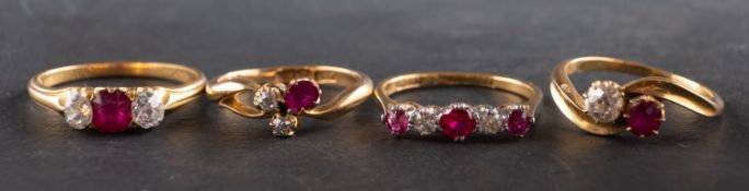 Four ruby and diamond rings, including a ruby and diamond cross-over ring,