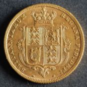 An 1884 Victorian half sovereign.