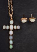 An opal, cruciform pendant and opal ear studs,
