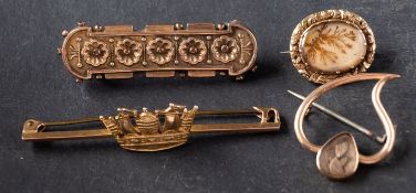 Four brooches, including a Merchant Navy sweetheart brooch,