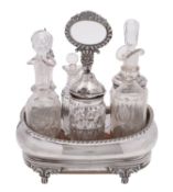 A George IV silver cruet stand, maker HR, London 1825, marks rubbed, of barge shape,