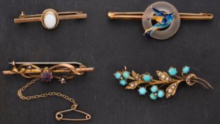 Four brooches,