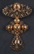 A 19th century, table-cut diamond, openwork three-piece stomacher, of foliate design,