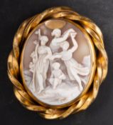 A shell cameo pendant, depicting The Three Graces and a child in a classical landscape,