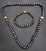 A cultured 'Tahitian' style pearl necklace and bracelet, diameter of cultured pearls on necklace