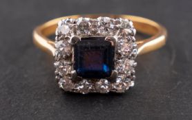 A square, step-cut probably synthetic spinel and round, brilliant-cut diamond cluster ring,