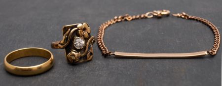 Two rings and a bracelet, including a ring with a white paste and floral decoration, stamped '585',