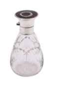 A George V silver, tortoishell and glass dressing table bottle, maker's mark rubbed, London 1919,