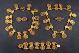 A suite of jewellery made of early 19th century, gilded brass, watch cocks, including two necklaces,