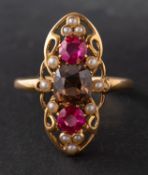 An 18ct gold, brown zircon, synthetic ruby and seed pearl openwork ring,