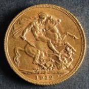 A 1912 Georgian Gold Sovereign.