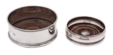 WITHDRAWN An Elizabeth II silver magnum bottle coaster, Garrard and Co, London, 1967,